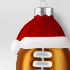 Christmas Glass Football With Santa Hat Ornament - Wondershop™ 3 Christmas Glass Football With Santa Hat Ornament - Wondershop™ -Wondershop GUEST a30bccba a93d 43f3 aef3 bc8dc7895cc4